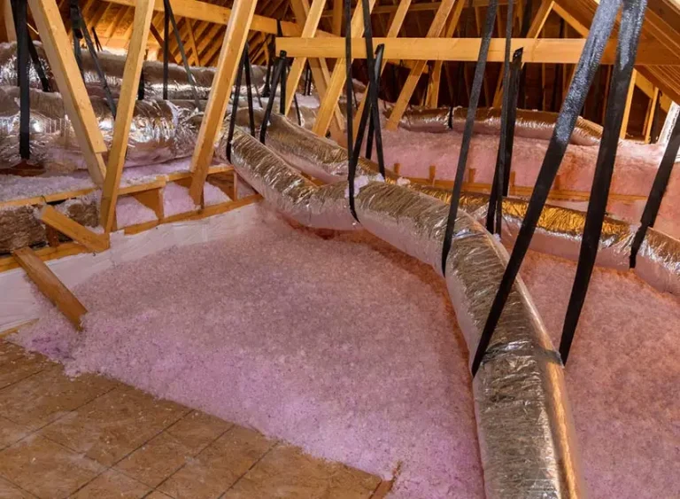 Attic showing foam insulation and newly installed ductwork